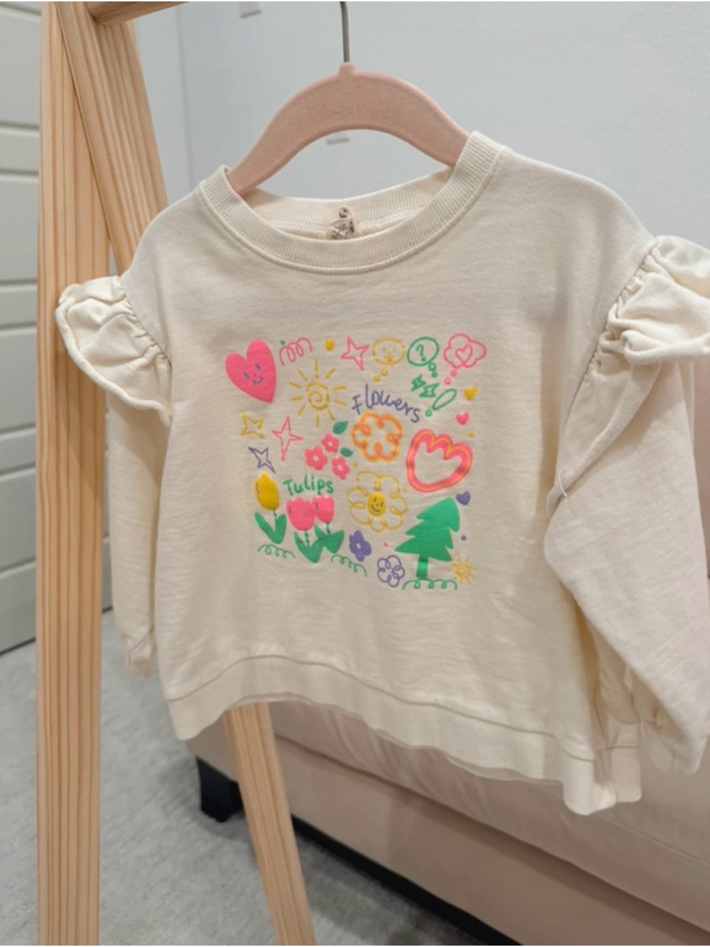 Cream Sweatshirt with Colorful Floral Doodle and Ruffle Sleeves